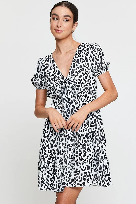 Comfortable yet stylish outfits for women on the go   Geo Print Mini Dress Short Sleeve V Neck Tie